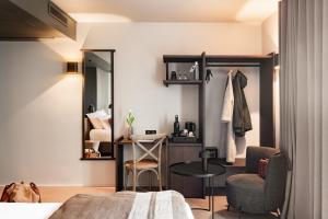 Postel nebo postele na pokoji v ubytování Hôtel L'Adresse - Entièrement rénové