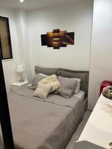 Ένα ή περισσότερα κρεβάτια σε δωμάτιο στο New central nice sea down town