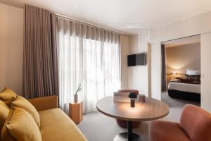 Posezení v ubytování Hôtel L'Adresse - Entièrement rénové