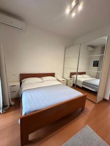 Postel nebo postele na pokoji v ubytování Piazza Salotto + 20 fotografií