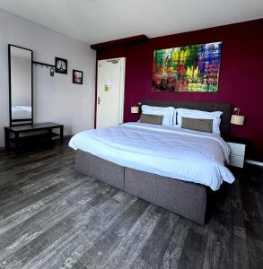 Postel nebo postele na pokoji v ubytování Hotel Parc & Lac