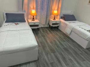 Postel nebo postele na pokoji v ubytování Hudhuveli Residence + 6 fotografií