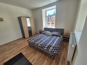 Postel nebo postele na pokoji v ubytování Apartmán pro 4 osoby, Vejprty