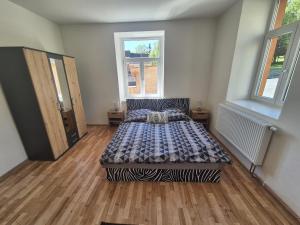Postel nebo postele na pokoji v ubytování Apartmán pro 4 osoby, Vejprty