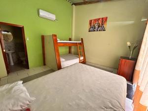 Postel nebo postele na pokoji v ubytování HotelCascol