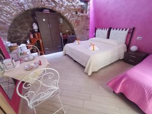 Postel nebo postele na pokoji v ubytování B&B da Rosario