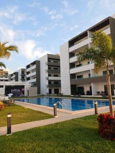 Bazén v ubytování Mazatlán Vacation Apartment Marina Cerritos Condominios nebo v jeho okolí