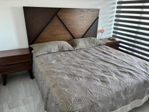 Postel nebo postele na pokoji v ubytování Mazatlán Vacation Apartment Marina Cerritos Condominios + 17 fotografií