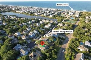 luchtfoto van een buitenwijk met een rode ster in het midden bij Pool Hot Tub Beach Gear included in Corolla