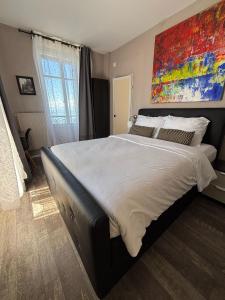 Postel nebo postele na pokoji v ubytování Hotel Parc & Lac