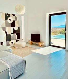 TV a/nebo společenská místnost v ubytování Spiti su in Paros - Naousa Piscina Privata