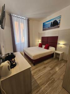 Postel nebo postele na pokoji v ubytování Affittacamere 5 Terre Dolci Sogni