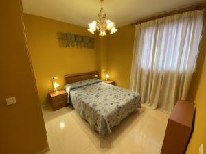 Postel nebo postele na pokoji v ubytování Apartamentos Marina Park