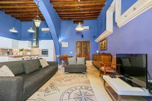 Телевизор и/или развлекательный центр в Blue Oak House
