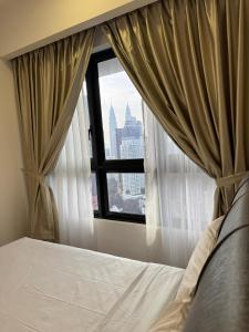Ein Bett oder Betten in einem Zimmer der Unterkunft Agile Milestone service suite TRX by KL