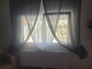 Postel nebo postele na pokoji v ubytování Alex Home 1