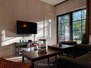 TV a/nebo společenská místnost v ubytování Lindvallen Ski Resort Pool and Padel - Sauna - 6 Guests