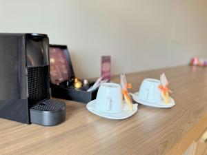 Comodidades para preparar café e chá em Continental Inn