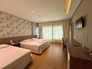 Cama ou camas em um quarto em Continental Inn