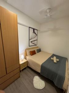Ein Bett oder Betten in einem Zimmer der Unterkunft Agile Milestone service suite TRX by KL