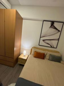 Ein Bett oder Betten in einem Zimmer der Unterkunft Agile Milestone service suite TRX by KL