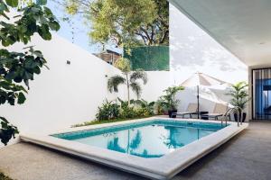 a swimming pool in the backyard of a house at Casa Ivanna Vallarta in Puerto Vallarta