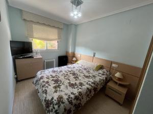 Postel nebo postele na pokoji v ubytování Apartamentos Marina Park + 37 fotografií