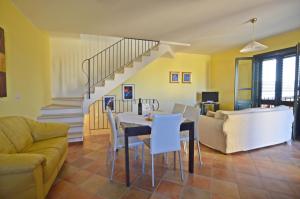 Posezení v ubytování Casa Vacanza Arbatax + 15 fotografií