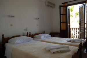 Postel nebo postele na pokoji v ubytování Asteri Hotel + 37 fotografií