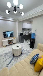 Χώρος καθιστικού στο Modern Luxury 1BR in Kilimani WIFI,Netflix,free packing