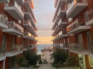 a view of the ocean from an apartment building at BlueWaveapartments 2 in Shëngjin