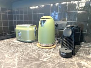 a appliance sitting on a counter in a kitchen at Heliconia in Bari