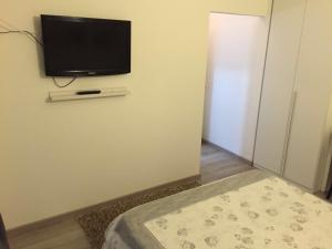 TV a/nebo společenská místnost v ubytování Acqua di Mare