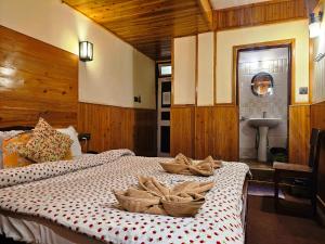 Postel nebo postele na pokoji v ubytování Hotel Golden Orchid