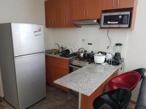 Nhà bếp/bếp nhỏ tại Lima Flats