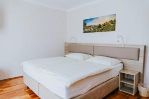 Postel nebo postele na pokoji v ubytování Gasthaus zur Waldschenke