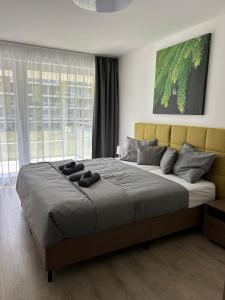 Ένα ή περισσότερα κρεβάτια σε δωμάτιο στο Dingi 102