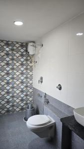 Koupelna v ubytování Gokul Guest House