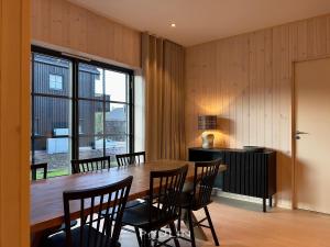 Posezení v ubytování Lindvallen Ski Resort Pool and Padel - Sauna - 7 Guests