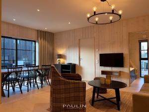 TV a/nebo společenská místnost v ubytování Lindvallen Ski Resort Pool and Padel - Sauna - 7 Guests