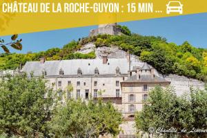a building on top of a mountain with trees at LE MACHU PICCHU - Self Checkin Automatique - Netflix - 15 Min de Giverny in Bonnières-sur-Seine