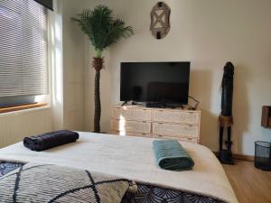 Postel nebo postele na pokoji v ubytování Africando - Spa & Sauna