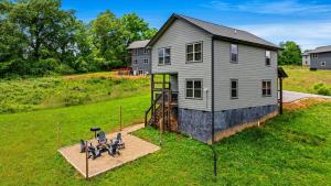 an aerial view of a house with a backyard at Smoky Oasis, Hot Tub, Luxury Sauna, Fire Pit, Arcade Games, Free Pets in Sevierville