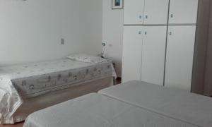 Posteľ alebo postele v izbe v ubytovaní Casa Palmira
