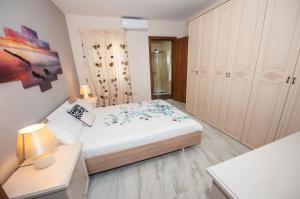 Postel nebo postele na pokoji v ubytování The Waves holiday apartment