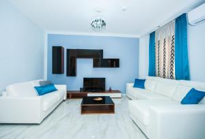 TV a/nebo společenská místnost v ubytování The Waves holiday apartment