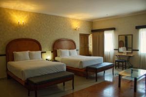 Postel nebo postele na pokoji v ubytování Hotel Palacio Maya + 37 fotografií