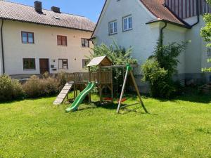 Zahrada ubytování Souterrain Apartment mit Gartenblick + 3 fotografie