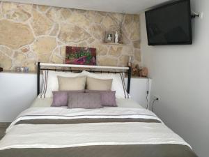 Postel nebo postele na pokoji v ubytování Casa di Lavanda + 37 fotografií