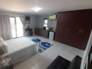 Φωτογραφία από το άλμπουμ του Trinity and Bennett Enterprises 40 Sycamore σε Roodepoort